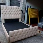 upholstered bed with foot end