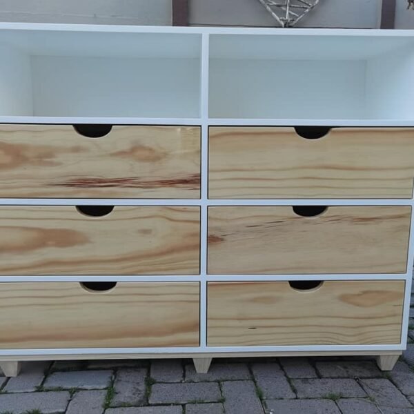 Chest of drawer with open compartments at the top